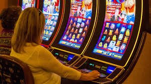 k777 Philippines app on mobile phone showing sports betting and live casino interface