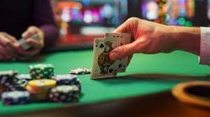 Filipino player using k777 mobile app to bet on basketball and play slots on smartphone